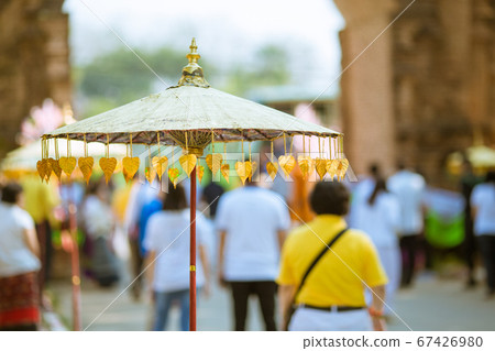 Umbrellas decorated with leaves in Kathin ceremony. Umbrellas decorated with leaves in Kathin ceremony. 67426980