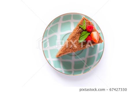 The piece of chocolate cake on white plate. A 67427330
