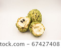 Three custard apples placed on a white ground. 67427408
