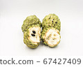 Four custard apples placed on a white ground. 67427409