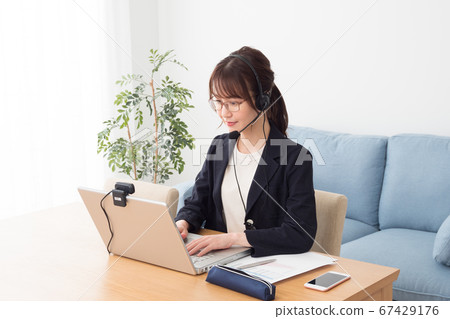 Woman working on telework Woman working on telework 67429176