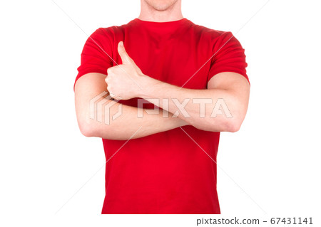 Front view of confident male in red t-shirt showing thumbs up gesture isolated 67431141