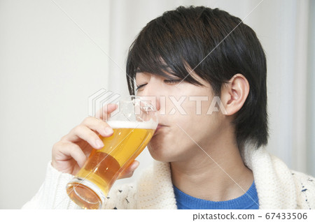 Male drinking beer Male drinking beer 67433506