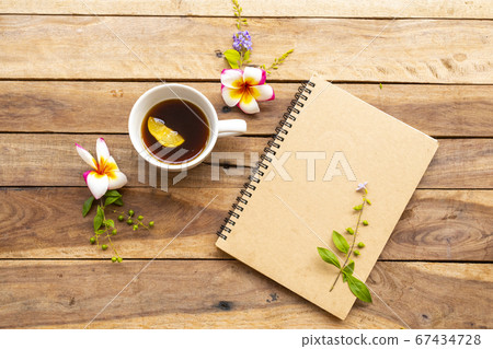 notebook planner for business work with hot coffee lemon, flowers frangipani ,purple flowers notebook planner for business work with hot coffee lemon, flowers frangipani ,purple flowers 67434728