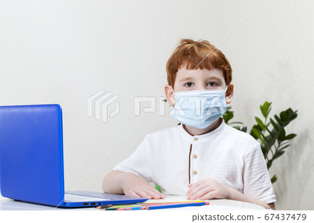 boy in a medical mask boy in a medical mask 67437479