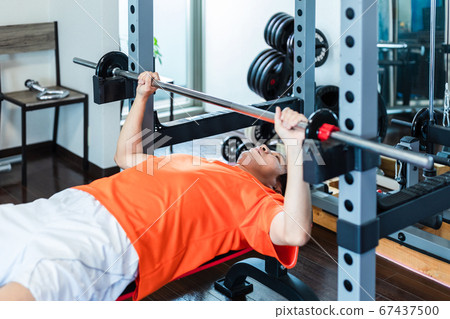 Men training in a private gym 67437500