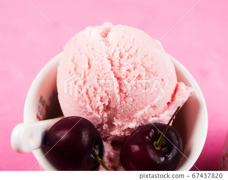 Strawberry ice cream cups with cherries, macro Strawberry ice cream cups with cherries, macro 67437820