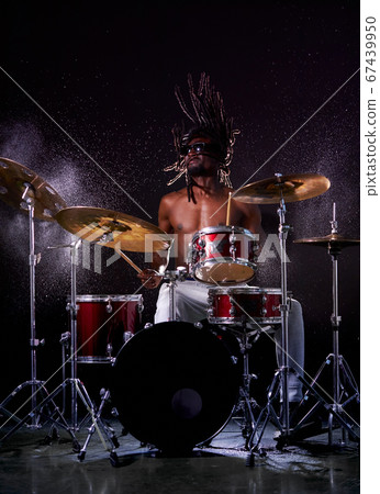 talented and professional african man playing on drums in studio talented and professional african man playing on drums in studio 67439950