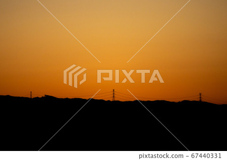 Mountains and power lines before dawn Mountains and power lines before dawn 67440331