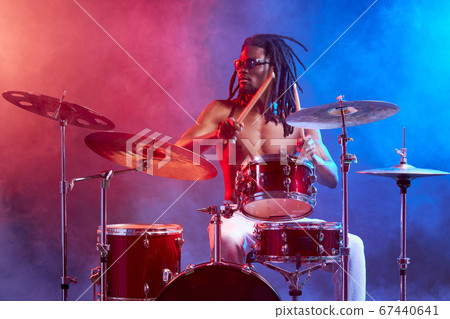 portrait of talented drummer man with black naked skin portrait of talented drummer man with black naked skin 67440641
