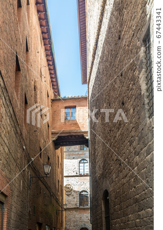 Old street in Siena 67443341