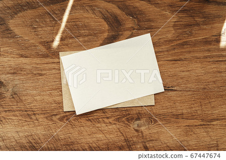 Stacks of businesscards with copy space on wooden background Stacks of businesscards with copy space on wooden background 67447674