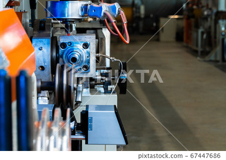 Cable production. Close up of a cable reel Cable production. Close up of a cable reel 67447686