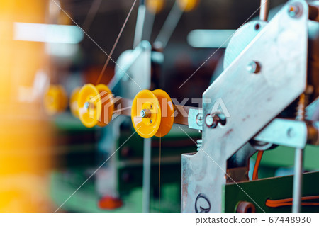 Cable production. Close up of a cable reel 67448930