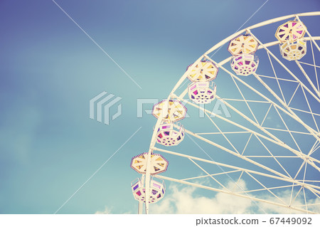 Retro toned picture of a Ferris wheel 67449092