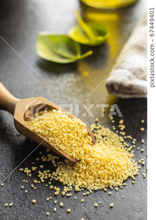 Dry yellow couscous Dry yellow couscous 67449401