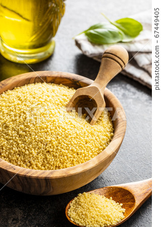 Dry yellow couscous Dry yellow couscous 67449405