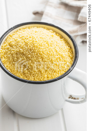 Dry yellow couscous Dry yellow couscous 67449406