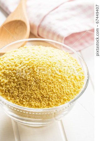 Dry yellow couscous Dry yellow couscous 67449407
