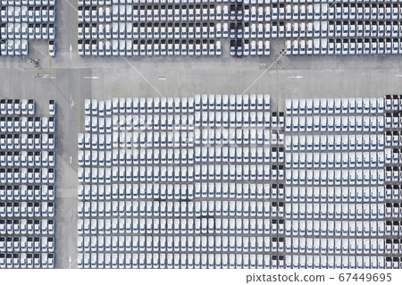 Aerial view of stock new cars parking in industrial zone  67449695