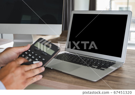 Man of business man hand working on laptop Man of business man hand working on laptop 67451320