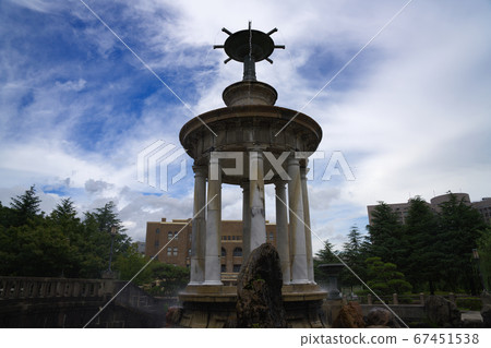 Fountain tower symbol of Tsurumai Park, landscape with blue sky and white clouds Fountain tower symbol of Tsurumai Park, landscape with blue sky and white clouds 67451538