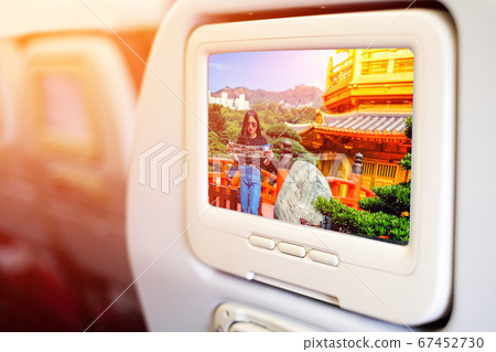 Aircraft monitor in front of passenger seat 67452730