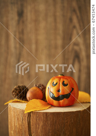 Halloween image on a stump 67453474