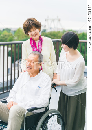 Smiling senior family wheelchair 67453531