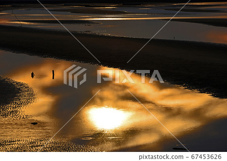 Sunset scenery with tideland 67453626