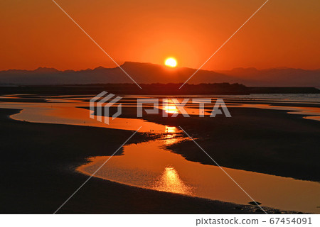 Sunset scenery with tideland 67454091