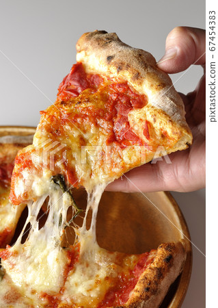 A cut that also got a pizza to eat Margherita A cut that also got a pizza to eat Margherita 67454383
