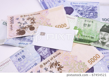 Credit card on top of open bills 67454521