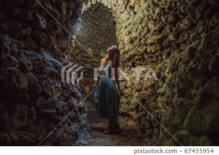 Woman tourist in Chua Tu Van temple made of shells and corals or the dragon maze. Travel to Vietnam Concept Woman tourist in Chua Tu Van temple made of shells and corals or the dragon maze. Travel to Vietnam Concept 67455954