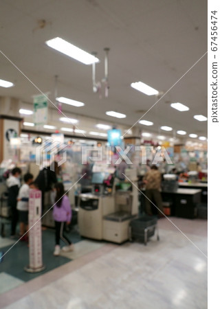 Blur image of self-checkout in supermarket 67456474