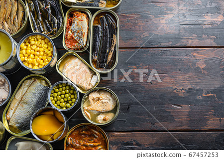 Canned preserves food in tin open cans. with fresh 67457253