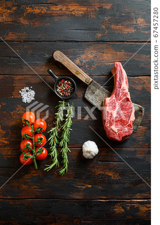 Fresh Cowboy steak cut on meat cleaver. Organic 67457280