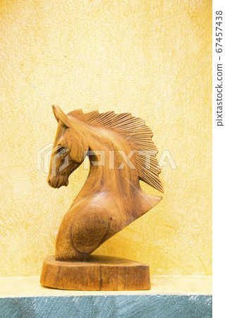 wood carving of a horse head. wood carving of a horse head. 67457438