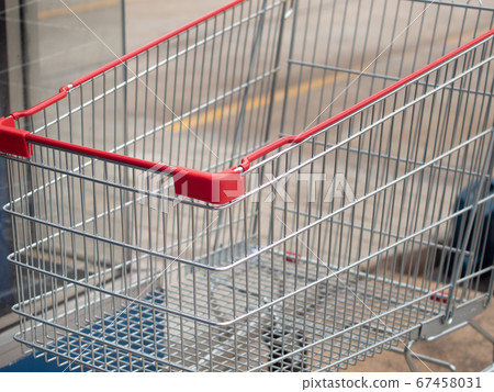 Close up of Shopping cart in parking areas Close up of Shopping cart in parking areas 67458031