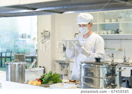 Male cook's lunch center kitchen 67458585