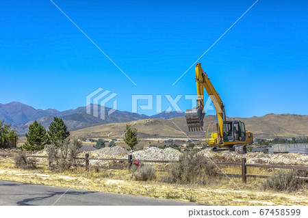 Heavy duty machinery on a construction site 67458599