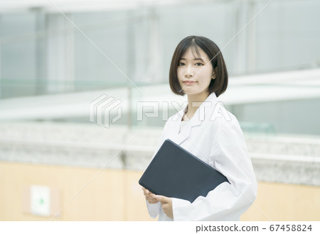 Female in white coat General-purpose laptop for medical professionals 67458824
