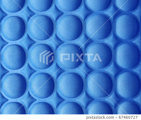 Blue circle on the back of the chair Blue circle on the back of the chair 67460727