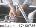 Hand of senior doing hand washing 67460786
