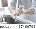 Hand of senior doing hand washing 67460793
