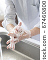 Hand of senior doing hand washing 67460800