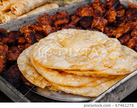 Crispy fried Naan bread or Roti in India, Bangladesh, Sri Lanka or Pakistan. 67461278