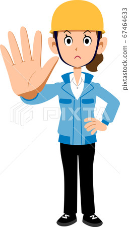 戴著頭盔的藍色工作服的女人停止 67464633