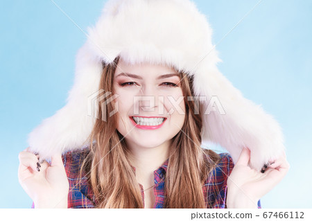Young woman in wintertime. Young woman in wintertime. 67466112