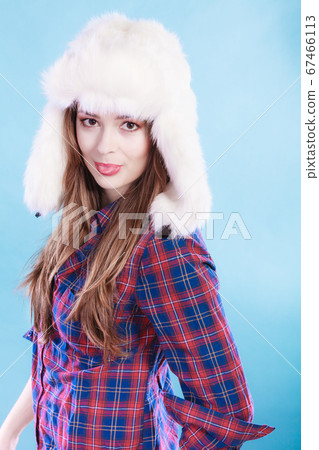 Young woman in wintertime. Young woman in wintertime. 67466113